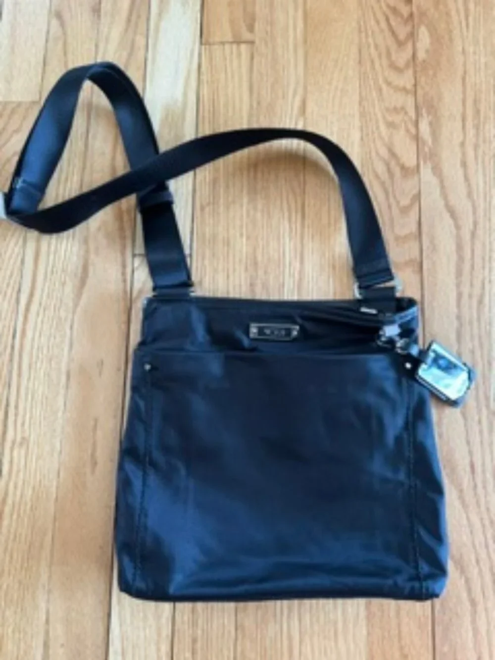 Tumi cross body bag